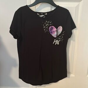 Black Justice shirt with sparkles and heart pocket.